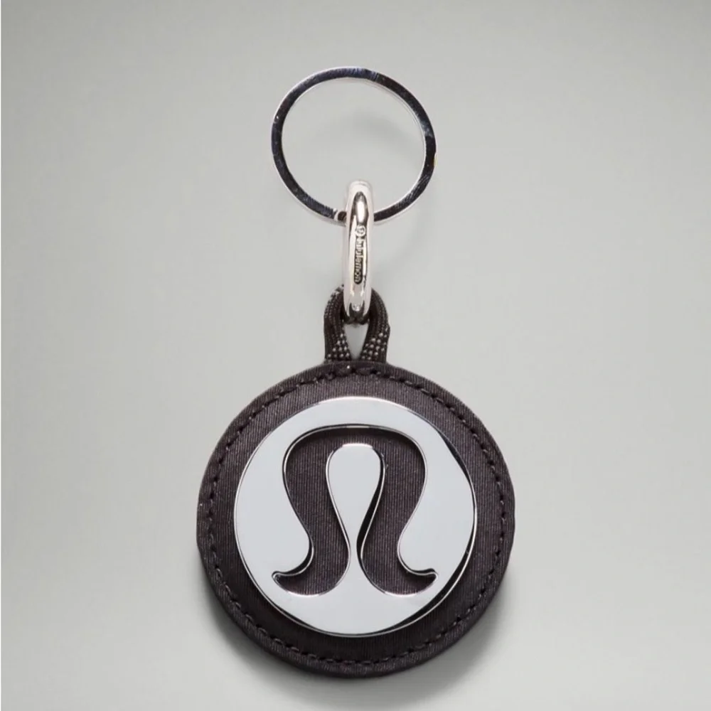 NWT Lululemon Keychain Large. Black/Silver reflection mirror. Good weight
